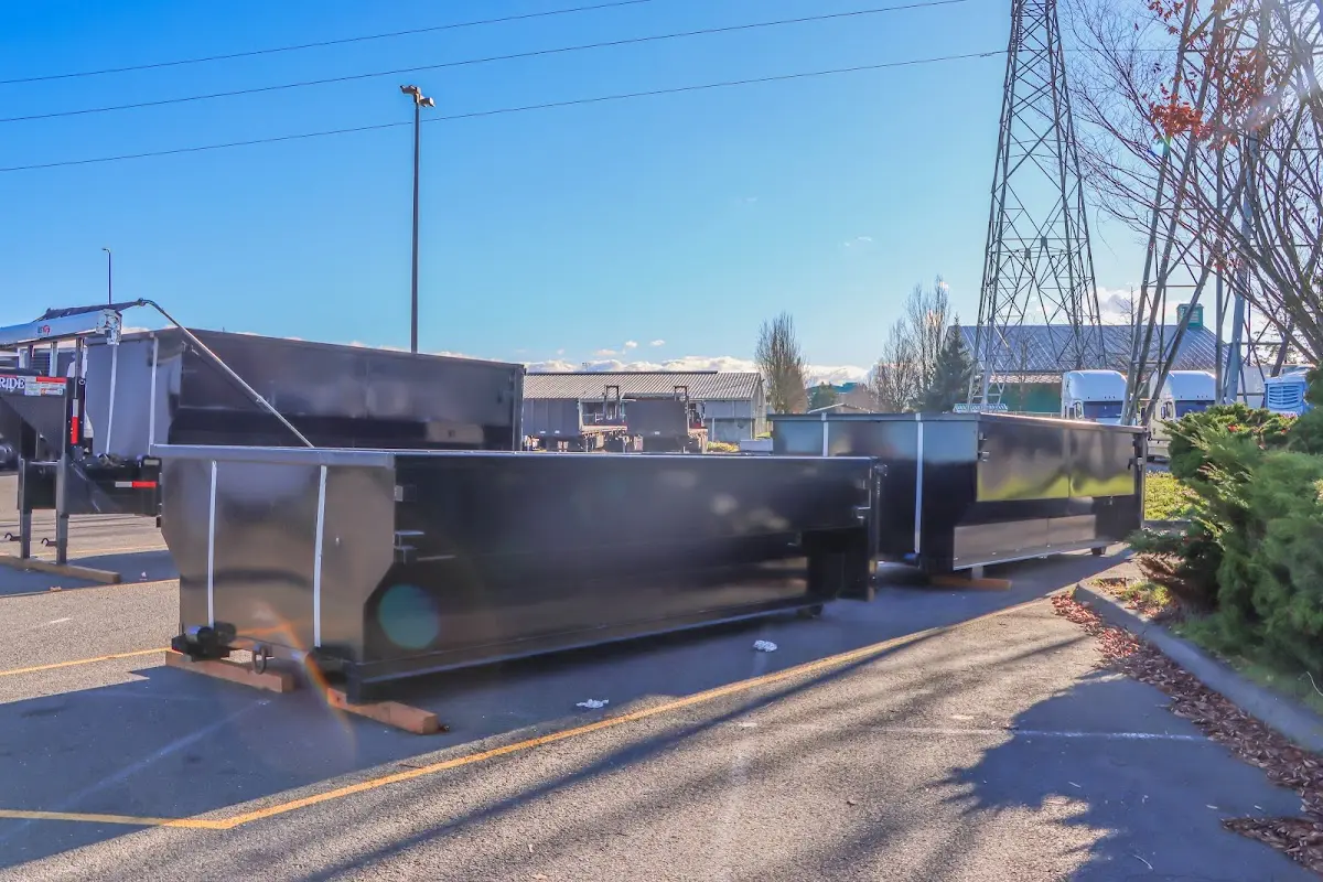 Roll-off dumpster ready for waste disposal at job site for 15 Yard Dumpster Rental in Zeeland